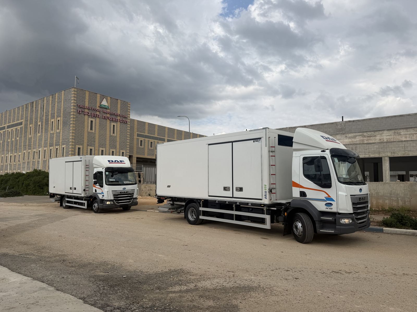 Two DAF trucks with Taglit refrigerated bodies